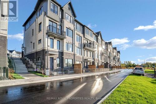 904 - 160 Densmore Road, Cobourg, ON - Outdoor With Facade