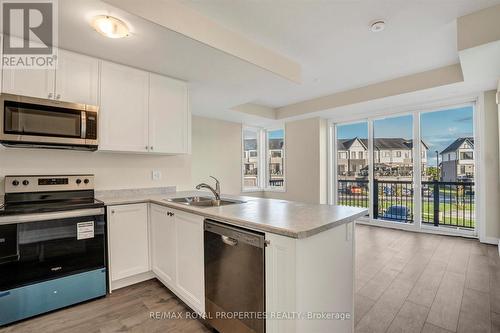 904 - 160 Densmore Road, Cobourg, ON - Indoor Photo Showing Kitchen With Stainless Steel Kitchen With Double Sink