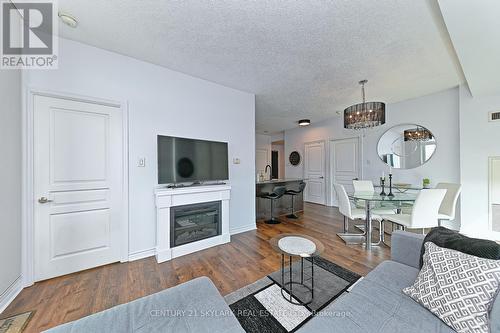 2902 - 3525 Kariya Drive, Mississauga, ON - Indoor Photo Showing Living Room With Fireplace