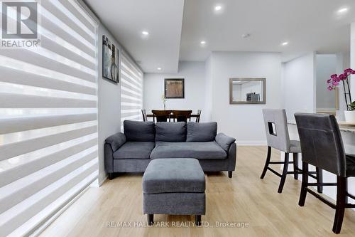 203 - 5289 Highway 7, Vaughan, ON - Indoor Photo Showing Living Room