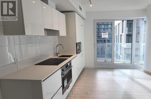 931 - 230 Simcoe Street, Toronto, ON - Indoor Photo Showing Kitchen With Upgraded Kitchen