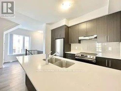 2 - 260 Twelfth Street, Toronto, ON - Indoor Photo Showing Kitchen With Upgraded Kitchen