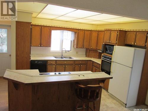 804 - 806 9Th Avenue W, Nipawin, SK - Indoor Photo Showing Kitchen With Double Sink