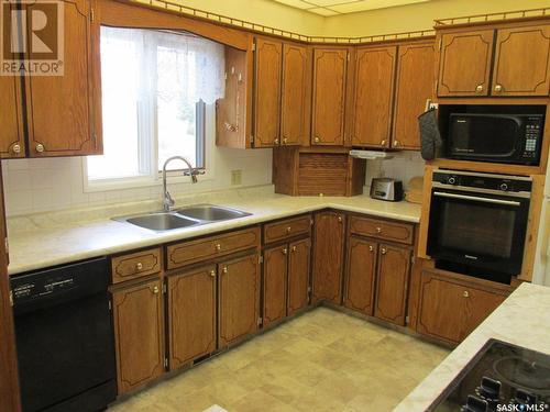 804 - 806 9Th Avenue W, Nipawin, SK - Indoor Photo Showing Kitchen With Double Sink