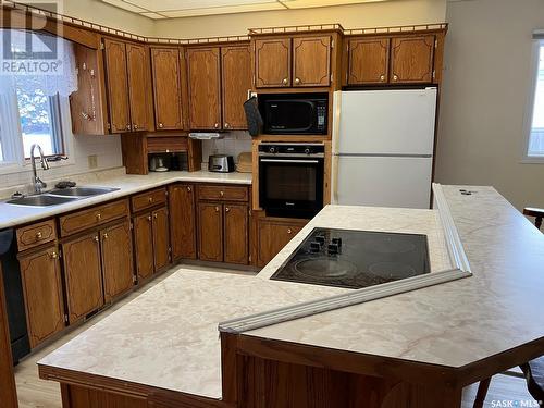 804 - 806 9Th Avenue W, Nipawin, SK - Indoor Photo Showing Kitchen With Double Sink