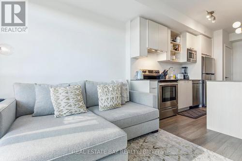 413 - 60 George Butchart Drive, Toronto, ON - Indoor Photo Showing Kitchen With Stainless Steel Kitchen