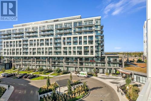 413 - 60 George Butchart Drive, Toronto, ON - Outdoor With Balcony With Facade