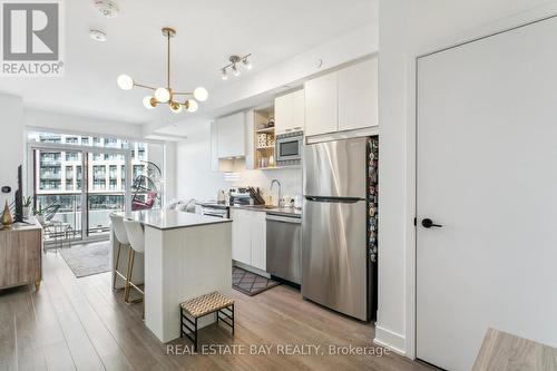 413 - 60 George Butchart Drive, Toronto, ON - Indoor Photo Showing Kitchen With Stainless Steel Kitchen