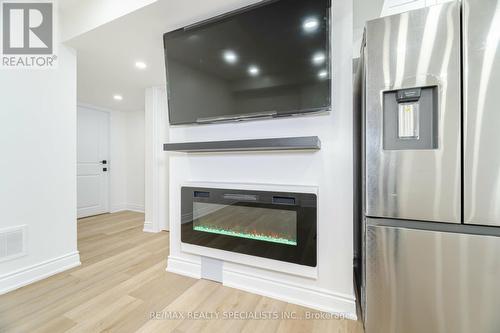 Bsmt - 190 Manly Lane, Milton, ON - Indoor Photo Showing Living Room With Fireplace