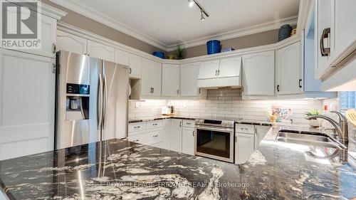 1174 Aintree Road, London, ON - Indoor Photo Showing Kitchen With Double Sink With Upgraded Kitchen