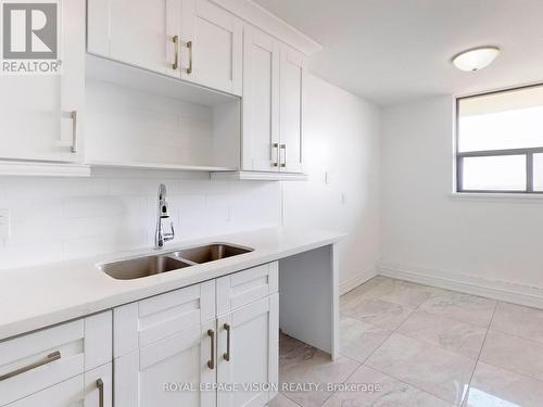 1714 - 100 Wingarden Court, Toronto, ON - Indoor Photo Showing Kitchen With Double Sink