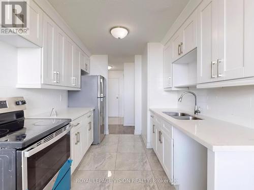 1714 - 100 Wingarden Court, Toronto, ON - Indoor Photo Showing Kitchen With Double Sink With Upgraded Kitchen