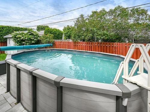 Cour - 26 Rue De La Reine-Des-Prés, Notre-Dame-De-L'Île-Perrot, QC - Outdoor With Above Ground Pool With Backyard