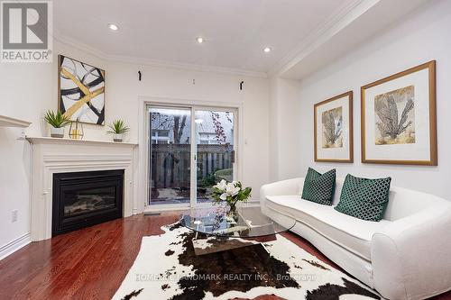 4 William Poole Way, Toronto, ON - Indoor Photo Showing Living Room With Fireplace