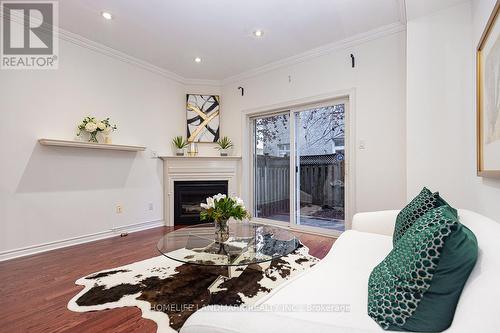 4 William Poole Way, Toronto, ON - Indoor Photo Showing Living Room With Fireplace