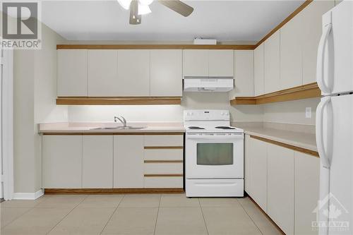 1485 Baseline Road Unit#210, Ottawa, ON - Indoor Photo Showing Kitchen With Double Sink