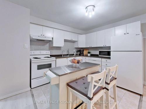 151-10 Moonstone Bywy, Toronto, ON - Indoor Photo Showing Kitchen With Double Sink