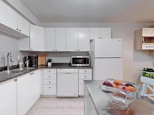 151-10 Moonstone Bywy, Toronto, ON - Indoor Photo Showing Kitchen With Double Sink