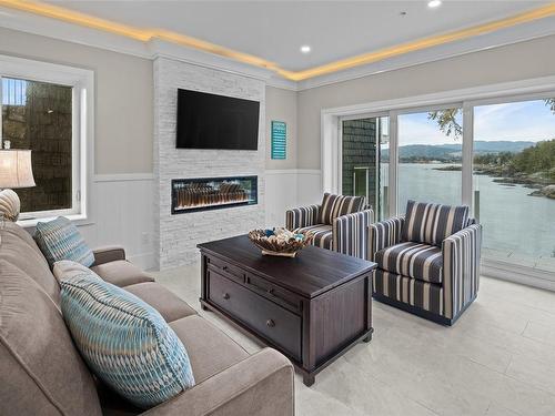 3B-1000 Sookepoint Pl, Sooke, BC - Indoor Photo Showing Living Room With Fireplace