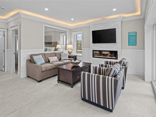 3B-1000 Sookepoint Pl, Sooke, BC - Indoor Photo Showing Living Room With Fireplace