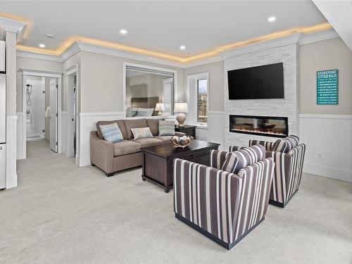 3B-1000 Sookepoint Pl, Sooke, BC - Indoor Photo Showing Living Room With Fireplace