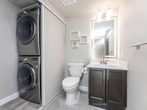 210-300 Manitoba St, Toronto, ON - Indoor Photo Showing Laundry Room