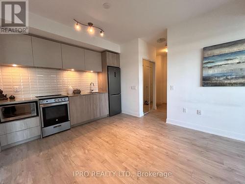 1404 - 65 Annie Craig Drive, Toronto, ON - Indoor Photo Showing Kitchen With Upgraded Kitchen