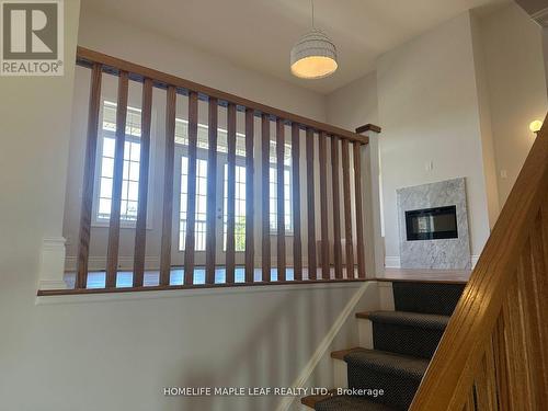 91 Robert Wilson Crescent, Georgina, ON - Indoor Photo Showing Other Room With Fireplace