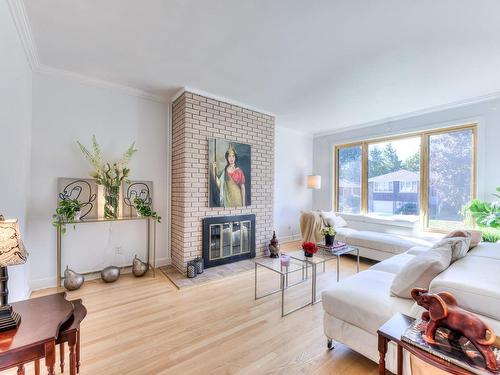 Salon - 784 38E Avenue, Montréal (Lachine), QC - Indoor Photo Showing Living Room With Fireplace