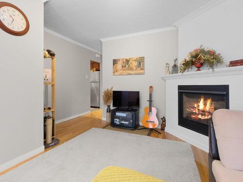 Salon - 553 Rue Alban-Lavigne, Gatineau (Gatineau), QC - Indoor Photo Showing Living Room With Fireplace