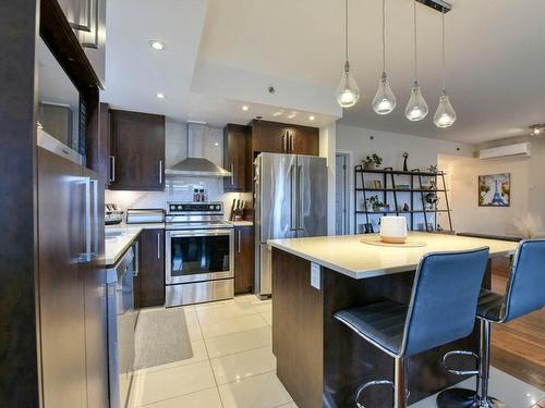 Kitchen - 313-3655 Rue Jean-Gascon, Montréal (Saint-Laurent), QC - Indoor Photo Showing Kitchen With Upgraded Kitchen