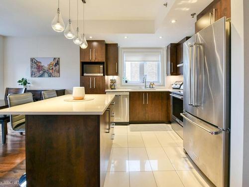 Kitchen - 313-3655 Rue Jean-Gascon, Montréal (Saint-Laurent), QC - Indoor Photo Showing Kitchen With Upgraded Kitchen