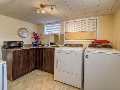 Salle de lavage - 153 Rue Mont-Royal, Laval (Sainte-Rose), QC - Indoor Photo Showing Laundry Room