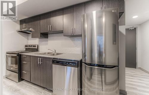 B404 - 275 Larch Street, Waterloo, ON - Indoor Photo Showing Kitchen With Double Sink