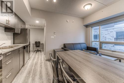 B404 - 275 Larch Street, Waterloo, ON - Indoor Photo Showing Kitchen With Double Sink