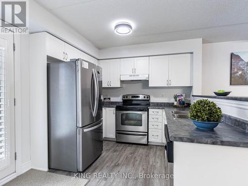 310 - 1350 Main Street E, Milton, ON - Indoor Photo Showing Kitchen