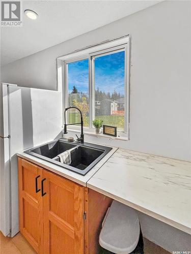 17 White Poplar Crescent, Candle Lake, SK - Indoor Photo Showing Kitchen With Double Sink