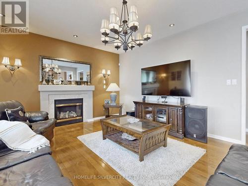 4 Farad Court, Brampton, ON - Indoor Photo Showing Living Room With Fireplace