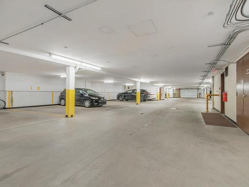 Stationnement - 402-361 Rue Jacques-Lavigne, Sainte-Thérèse, QC - Indoor Photo Showing Garage