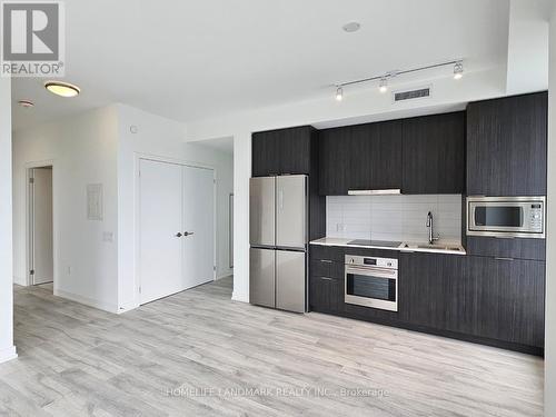 S1006 - 8 Olympic Garden Drive, Toronto, ON - Indoor Photo Showing Kitchen