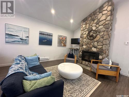 118 Eugene Drive, Sandy Beach, SK - Indoor Photo Showing Living Room With Fireplace