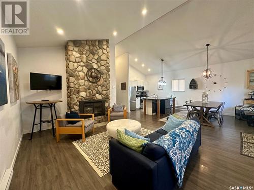 118 Eugene Drive, Sandy Beach, SK - Indoor Photo Showing Living Room With Fireplace