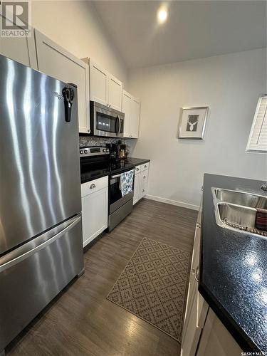 118 Eugene Drive, Sandy Beach, SK - Indoor Photo Showing Kitchen With Double Sink