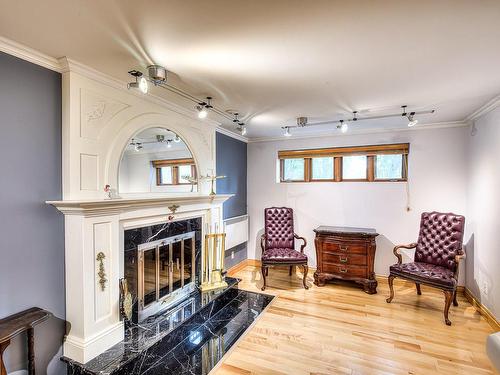 Salle familiale - 2194 Rue De Murcie, Laval (Vimont), QC - Indoor Photo Showing Living Room With Fireplace