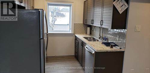 5 - 42 High Park Boulevard, Toronto, ON - Indoor Photo Showing Kitchen With Double Sink