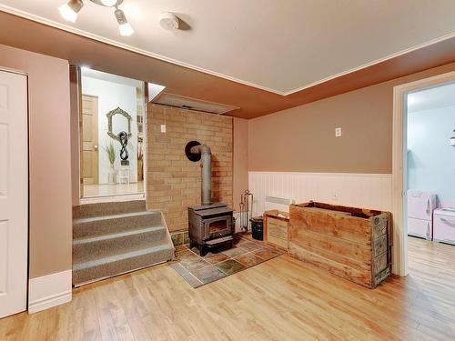 Basement - 245 Rue Joseph-Pariseau, Sherbrooke (Brompton/Rock Forest/Saint-Élie/Deauville), QC - Indoor Photo Showing Other Room With Fireplace