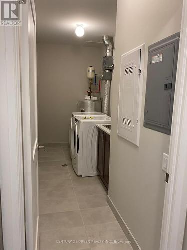 410 - 830 Megson Terrace, Milton, ON - Indoor Photo Showing Laundry Room