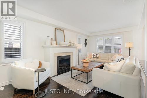 105 Chamomile Drive, Hamilton, ON - Indoor Photo Showing Living Room With Fireplace