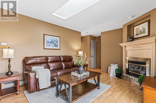 51 Silverbrook Drive, London, ON - Indoor Photo Showing Living Room With Fireplace