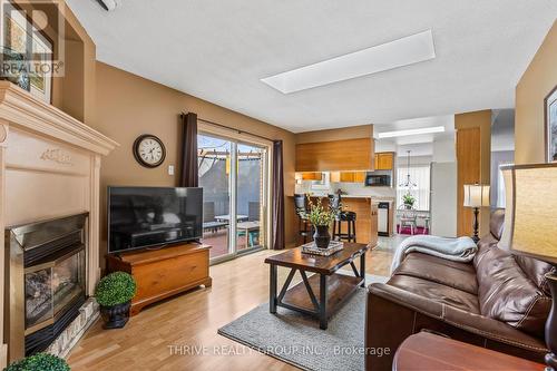 51 Silverbrook Drive, London, ON - Indoor Photo Showing Living Room With Fireplace